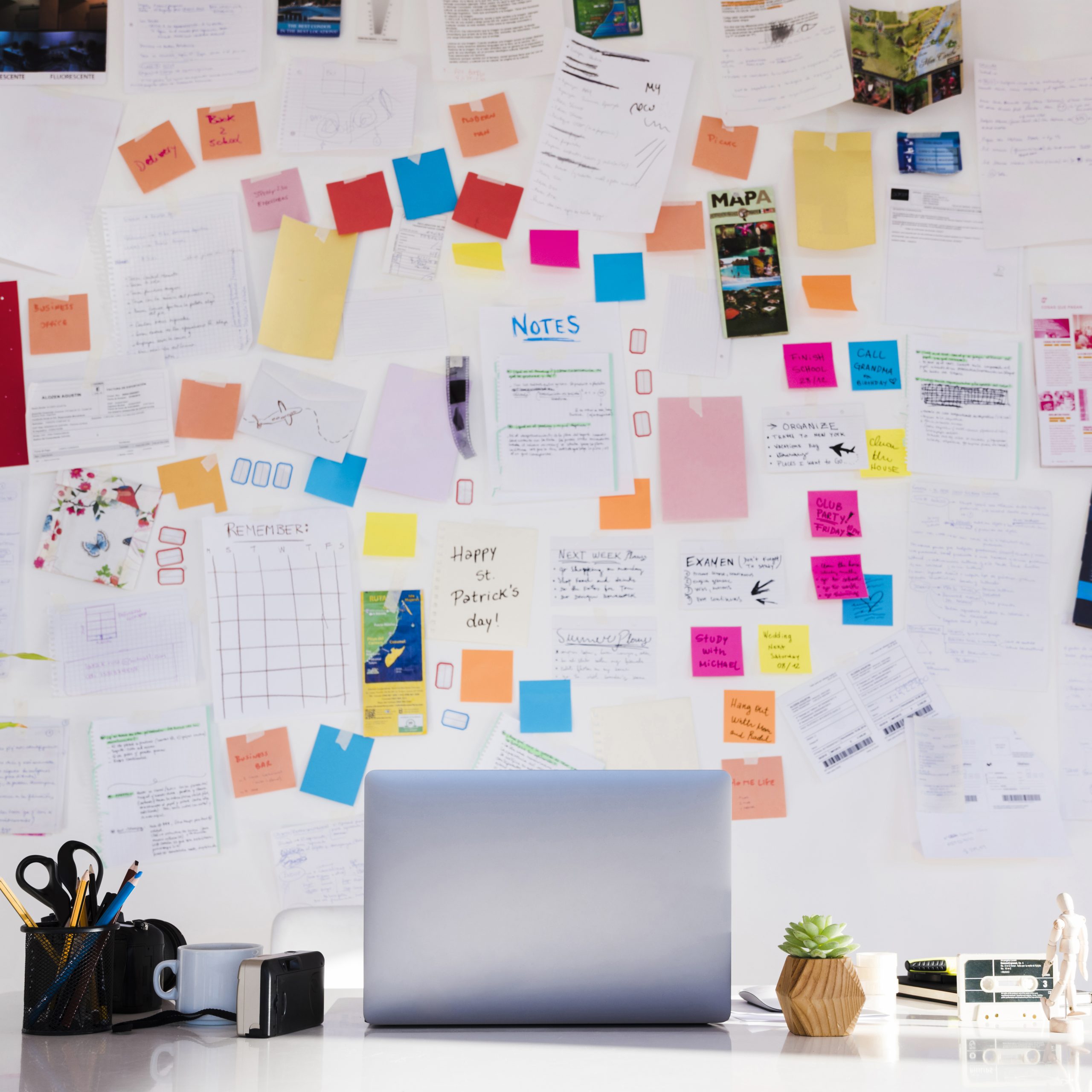 arrangement with desk notes wall